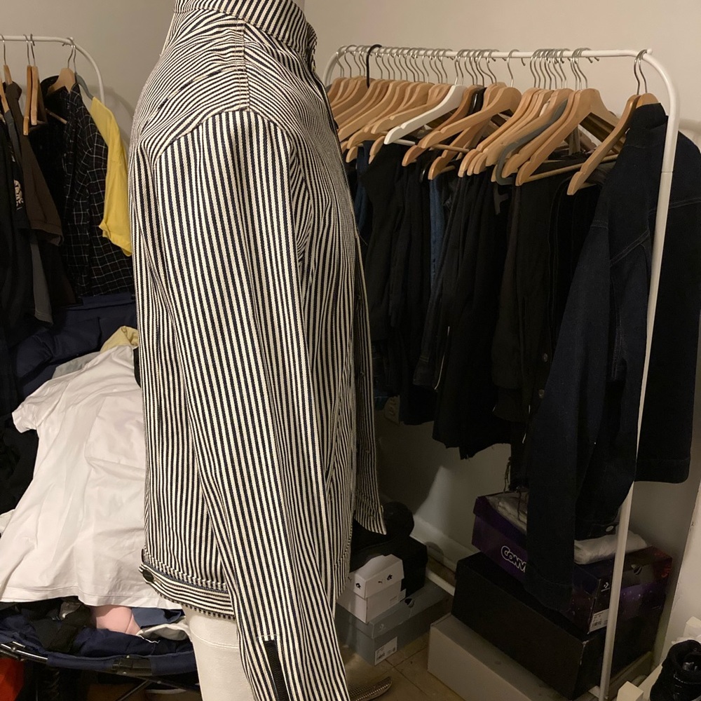 Pyer Moss vertical striped navy and white denim jacket with the Mandarin collar